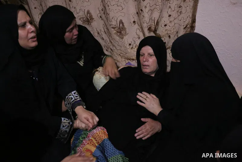 Relatives of Palestinian Naji Ghneim, 23, who died of his wounds endured during clashes with Israeli troops in a tent city protest where Palestinians demand the right to return to their homeland at the Israel-Gaza border...