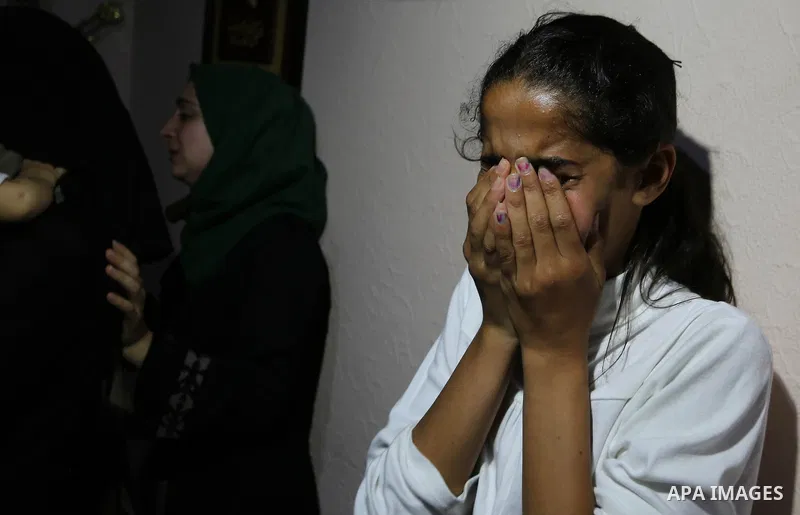 Relatives of Palestinian Naji Ghneim, 23, who died of his wounds endured during clashes with Israeli troops in a tent city protest where Palestinians demand the right to return to their homeland at the Israel-Gaza border...