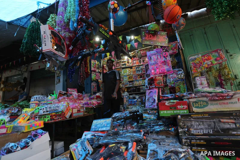 Palestinians shop at a market during the holy fasting month of Ramadan in Gaza city, on June 4, 2018. Ramadan is sacred to Muslims because it is during that month that tradition says the Koran was revealed to the Prophet...