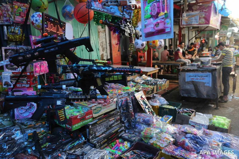 Palestinians shop at a market during the holy fasting month of Ramadan in Gaza city, on June 4, 2018. Ramadan is sacred to Muslims because it is during that month that tradition says the Koran was revealed to the Prophet...
