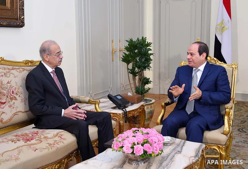 Egyptian President Abdel-Fattah al-Sisi meets with Prime Minister Sherif Ismail in Cairo, Egypt, on June 5, 2018. Photo by Egyptian President Office