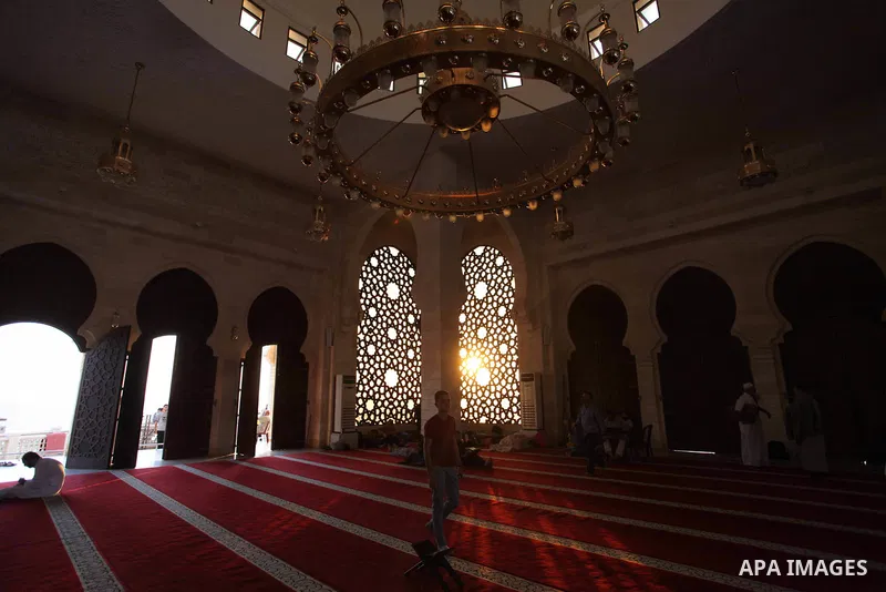Palestinians read the Koran, Islam's holiest book, at a mosque in Gaza City during the Muslim holy month of Ramadan, on June 6, 2018. Ramadan is sacred to Muslims because it is during that month that tradition says the K...