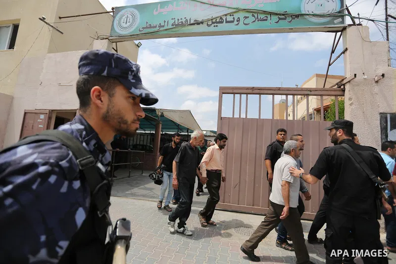 Palestinian prisoners leave the prison run by the Ministry of the Interior and National Security in Gaza Strip, in Dair Al Balah in the center of Gaza Strip on June 7, 2018. Security officials in Gaza Strip said on Thurs...