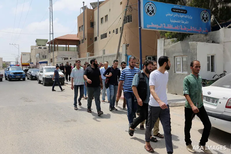 Palestinian prisoners leave the prison run by the Ministry of the Interior and National Security in Gaza Strip, in Dair Al Balah in the center of Gaza Strip on June 7, 2018. Security officials in Gaza Strip said on Thurs...