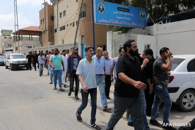 Palestinian prisoners leave the prison run by the Ministry of the Interior and National Security in Gaza Strip, in Dair Al Balah in the center of Gaza Strip on June 7, 2018. Security officials in Gaza Strip said on Thurs...