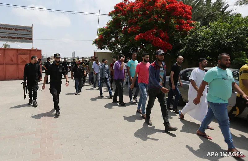 Palestinian prisoners leave the prison run by the Ministry of the Interior and National Security in Gaza Strip, in Dair Al Balah in the center of Gaza Strip on June 7, 2018. Security officials in Gaza Strip said on Thurs...