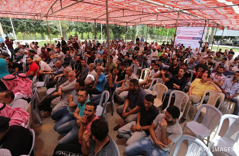 Palestinian prisoners leave the prison run by the Ministry of the Interior and National Security in Gaza Strip, in Dair Al Balah in the center of Gaza Strip on June 7, 2018. Security officials in Gaza Strip said on Thurs...