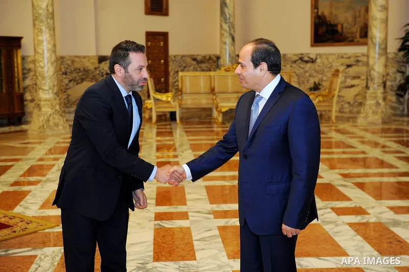 Egyptian President Abdel Fattah al-Sisi meets with Egypt's national football team before travelling to Russia to attend World Cup at the Ittihadiya presidential palace in Cairo, Egypt, June 9, 2018. Photo by Egyptian Pre...