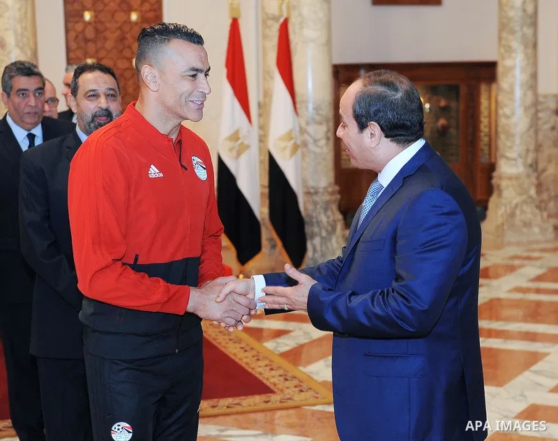 Egyptian President Abdel Fattah al-Sisi meets with Egypt's national football team before travelling to Russia to attend World Cup at the Ittihadiya presidential palace in Cairo, Egypt, June 9, 2018. Photo by Egyptian Pre...
