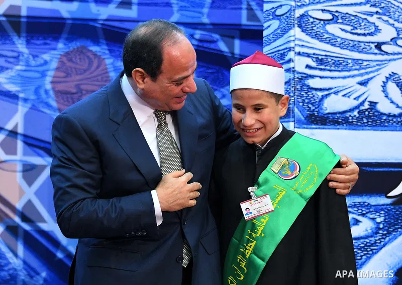 Egyptian President Abdel-Fattah al-Sisi takes part in the celebration of Laylat Al Qadr or Night of Power, in Cairo, Egypt, on June 11, 2018. Photo by Egyptian President Office