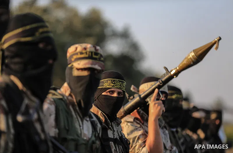 Palestinian militants from the Al-Quds Brigades, the armed wing of the Islamic Jihad movement guard the border in the east of Gaza city on the Muslim holy fasting month of Ramadan on June 13, 2018. Ramadan is sacred to M...