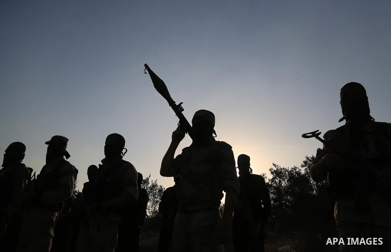 Palestinian militants from the Al-Quds Brigades, the armed wing of the Islamic Jihad movement guard the border in the east of Gaza city on the Muslim holy fasting month of Ramadan on June 13, 2018. Ramadan is sacred to M...