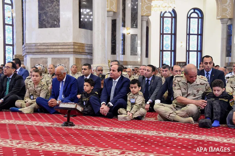 Egyptian President Abdel Fattah al-Sisi performs the morning prayer of Eid al-Fitr holiday which marks the end of the Muslim holy month of Ramadan, in Cairo, Egypt, on June 15, 2018. Eid al-Fitr marks the end of Muslim's...