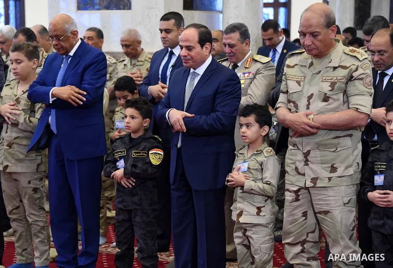 Egyptian President Abdel Fattah al-Sisi performs the morning prayer of Eid al-Fitr holiday which marks the end of the Muslim holy month of Ramadan, in Cairo, Egypt, on June 15, 2018. Eid al-Fitr marks the end of Muslim's...