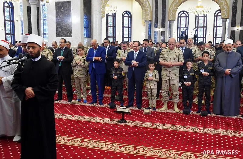 Egyptian President Abdel Fattah al-Sisi performs the morning prayer of Eid al-Fitr holiday which marks the end of the Muslim holy month of Ramadan, in Cairo, Egypt, on June 15, 2018. Eid al-Fitr marks the end of Muslim's...