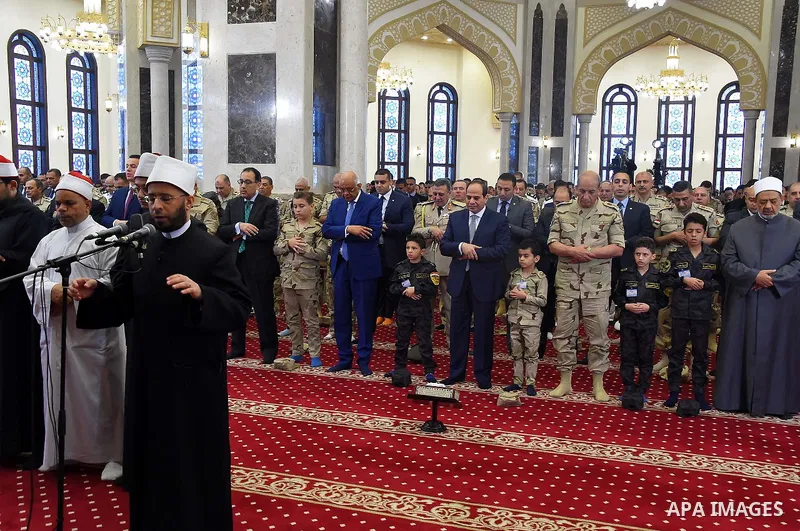 Egyptian President Abdel Fattah al-Sisi performs the morning prayer of Eid al-Fitr holiday which marks the end of the Muslim holy month of Ramadan, in Cairo, Egypt, on June 15, 2018. Eid al-Fitr marks the end of Muslim's...