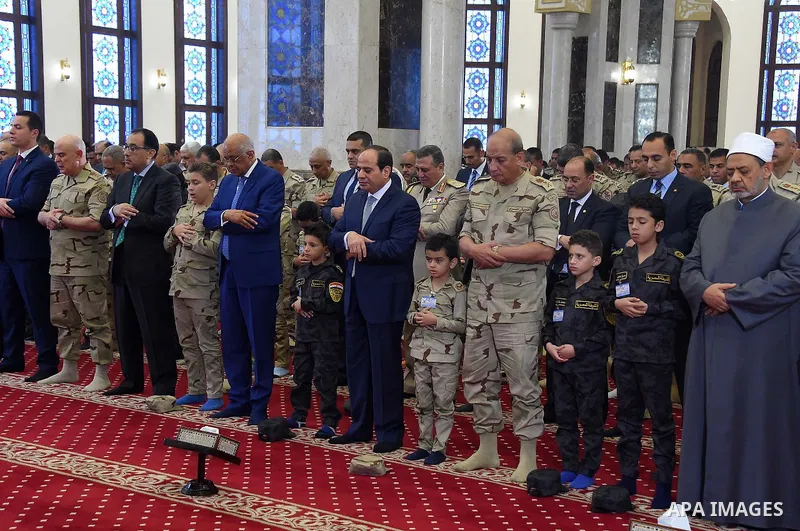 Egyptian President Abdel Fattah al-Sisi performs the morning prayer of Eid al-Fitr holiday which marks the end of the Muslim holy month of Ramadan, in Cairo, Egypt, on June 15, 2018. Eid al-Fitr marks the end of Muslim's...