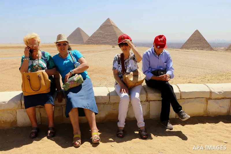 Delegation of the Italian Christian pilgrimage visit the Giza Pyramids on the outskirts of Cairo, Egypt, on June 18, 2018. Photo by Amr Sayed