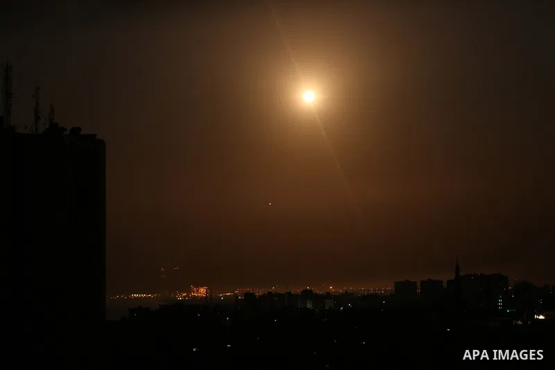 Missiles from the Iron Dome air defence system, designed to intercept and destroy incoming short-range rockets and artillery shells, from a position in the southern Israeli are seen from Gaza city on June 20, 2018. Photo...