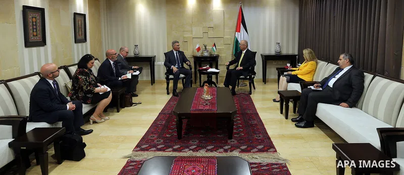 Palestinian Prime Minister Rami Hamdallah meets with Minister of Foreign Affairs of Malta, Carmelo Abela, in the West Bank city of Ramallah on June 21, 2018. Photo by Prime Minister Office