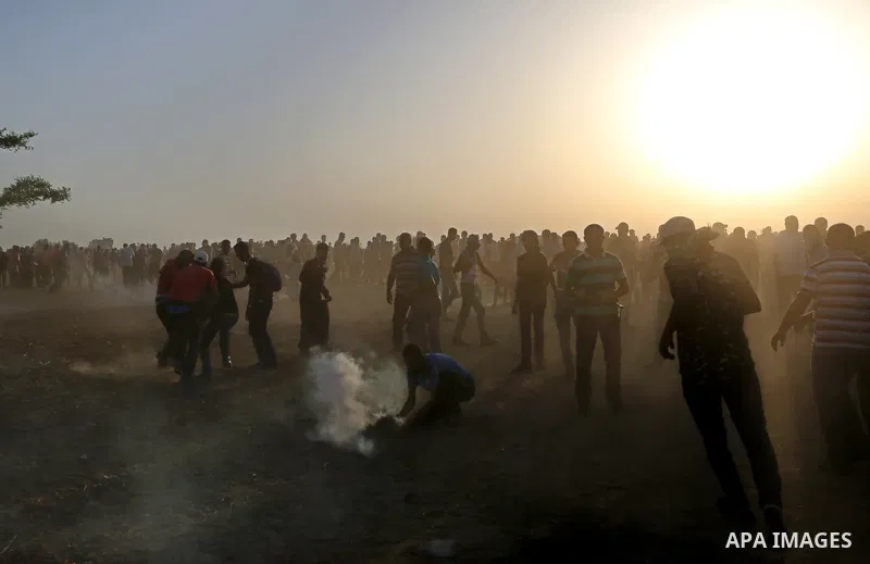 Palestinian protesters gather during clashes with Israeli troops in tents protest where Palestinian demand the right to return to their homeland at the Israel-Gaza border, in Khan Younis in the southern of Gaza Strip on...