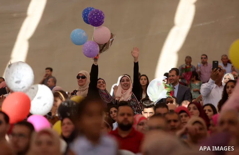 Palestinian students attend their graduation ceremony at the Birzeit University in the West Bank city of Ramallah, June 24, 2018. Photo by Shadi Hatem