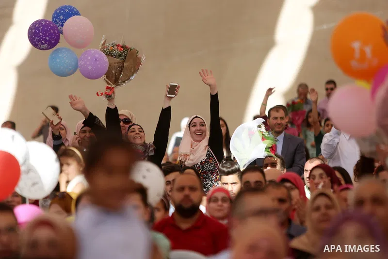 Palestinian students attend their graduation ceremony at the Birzeit University in the West Bank city of Ramallah, June 24, 2018. Photo by Shadi Hatem