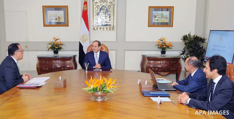 Egyptian President Abdel Fattah al-Sisi meets with Mustafa Madbouli, Prime Minister in Cairo, Egypt on June 26, 2018. Photo by Egyptian President Office
