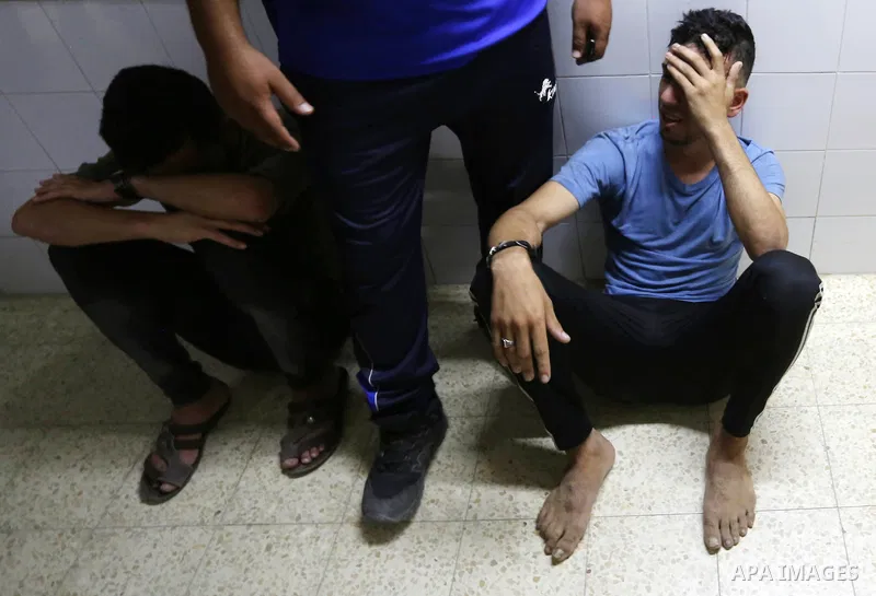 Relatives of Palestinian Mohammad Al-Hamayda, who was killed by Israeli troops during clashes in tents protest where Palestinian demand the right to return to their homeland at the Israel-Gaza border, mourn at a hospital...