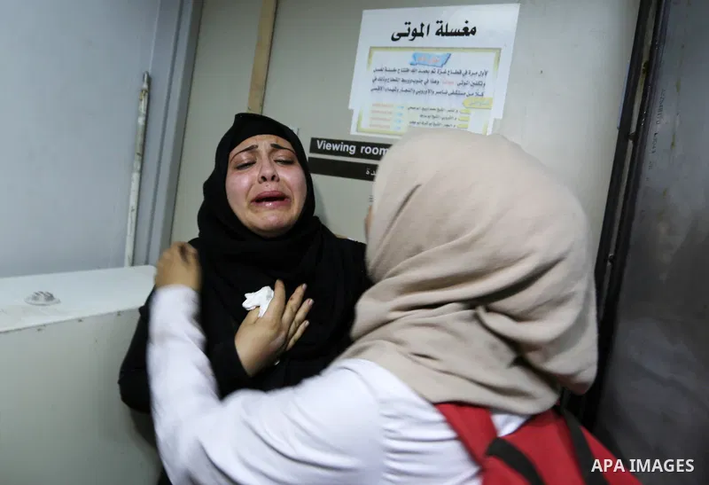 Relatives of 14-year-old Palestinian boy Yasser Abu Al-Naja, who was killed by Israeli troops during clashes in tents protest where Palestinian demand the right to return to their homeland at the Israel-Gaza border, mour...