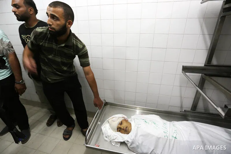 Relatives of 14-year-old Palestinian boy Yasser Abu Al-Naja, who was killed by Israeli troops during clashes in tents protest where Palestinian demand the right to return to their homeland at the Israel-Gaza border, mour...