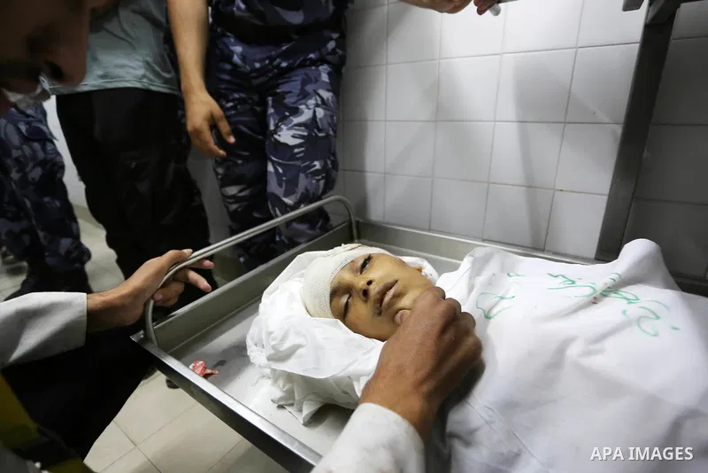 Relatives of 14-year-old Palestinian boy Yasser Abu Al-Naja, who was killed by Israeli troops during clashes in tents protest where Palestinian demand the right to return to their homeland at the Israel-Gaza border, mour...