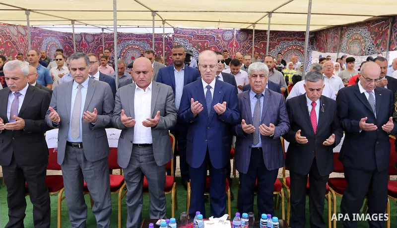 Palestinian Prime Minister Rami Hamdallah attends a ceremony of laying the foundation stone of the al-Zaytoun suburb, in the West Bank city of Nablus on June 30, 2018. Photo by Prime Minister Office