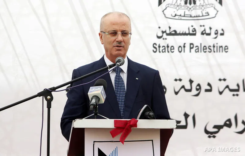 Palestinian Prime Minister Rami Hamdallah attends a ceremony of laying the foundation stone of the al-Zaytoun suburb, in the West Bank city of Nablus on June 30, 2018. Photo by Prime Minister Office