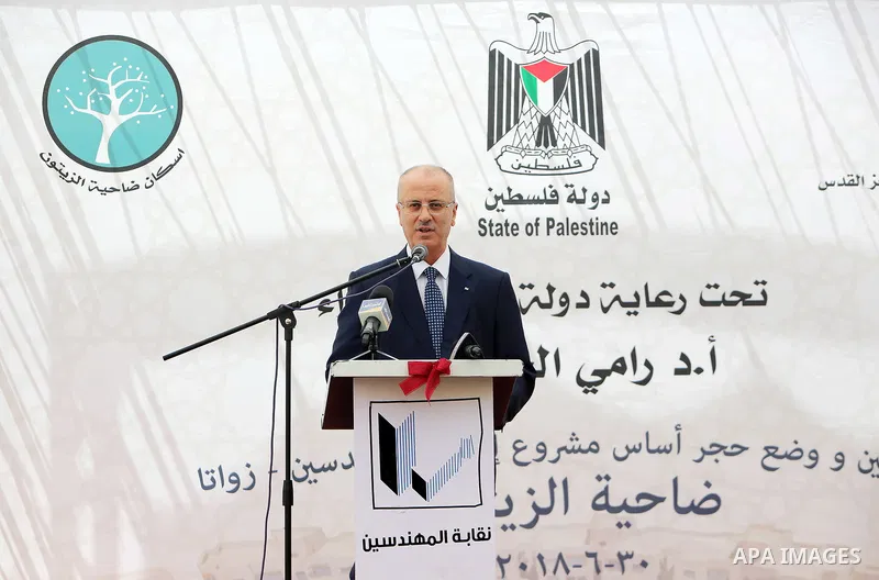Palestinian Prime Minister Rami Hamdallah attends a ceremony of laying the foundation stone of the al-Zaytoun suburb, in the West Bank city of Nablus on June 30, 2018. Photo by Prime Minister Office