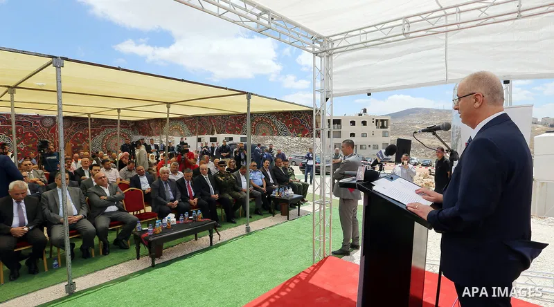 Palestinian Prime Minister Rami Hamdallah attends a ceremony of laying the foundation stone of the al-Zaytoun suburb, in the West Bank city of Nablus on June 30, 2018. Photo by Prime Minister Office