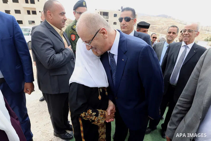 Palestinian Prime Minister Rami Hamdallah attends a ceremony of laying the foundation stone of the al-Zaytoun suburb, in the West Bank city of Nablus on June 30, 2018. Photo by Prime Minister Office