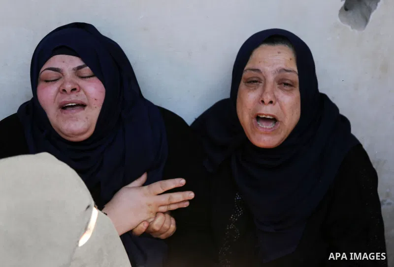 Relatives of 14-year-old Palestinian boy Yasser Abu Al-Naja, who was killed by Israeli troops during clashes in tents protest where Palestinian demand the right to return to their homeland at the Israel-Gaza border, mour...