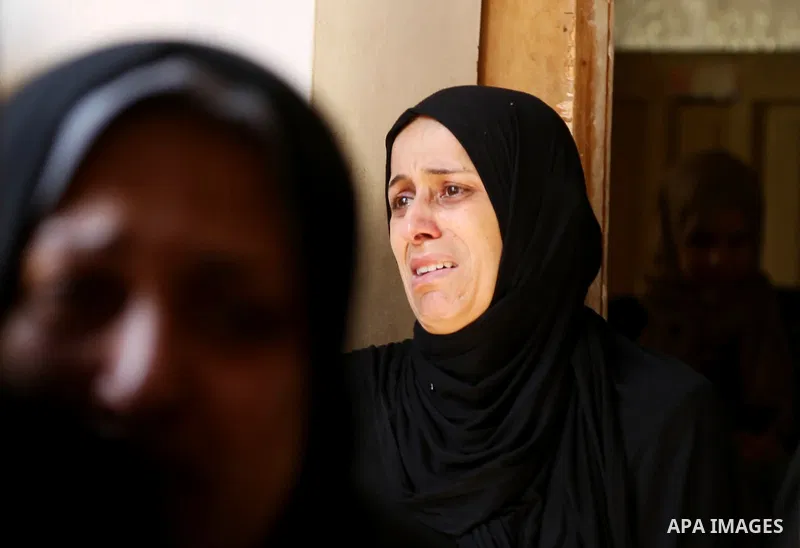 Relatives of 14-year-old Palestinian boy Yasser Abu Al-Naja, who was killed by Israeli troops during clashes in tents protest where Palestinian demand the right to return to their homeland at the Israel-Gaza border, mour...