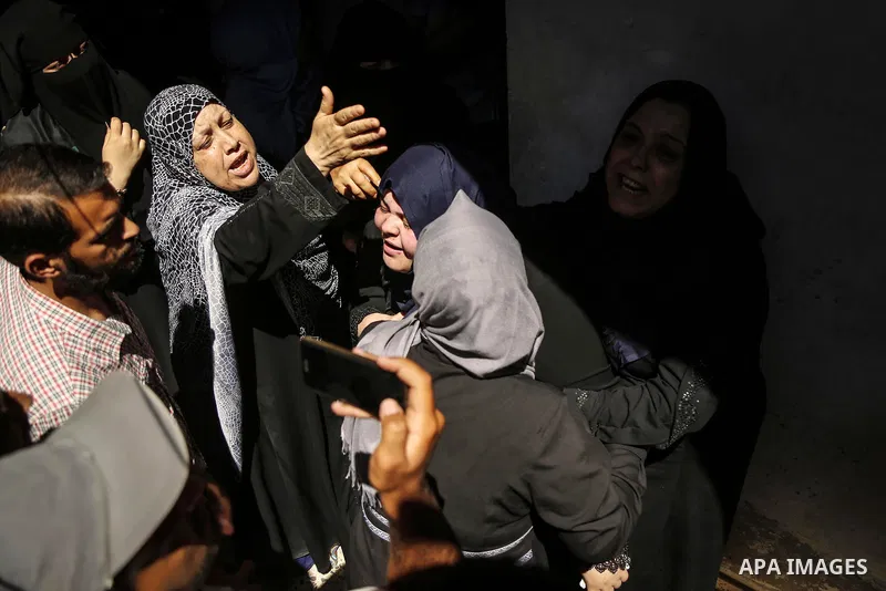 Relatives of 14-year-old Palestinian boy Yasser Abu Al-Naja, who was killed by Israeli troops during clashes in tents protest where Palestinian demand the right to return to their homeland at the Israel-Gaza border, mour...
