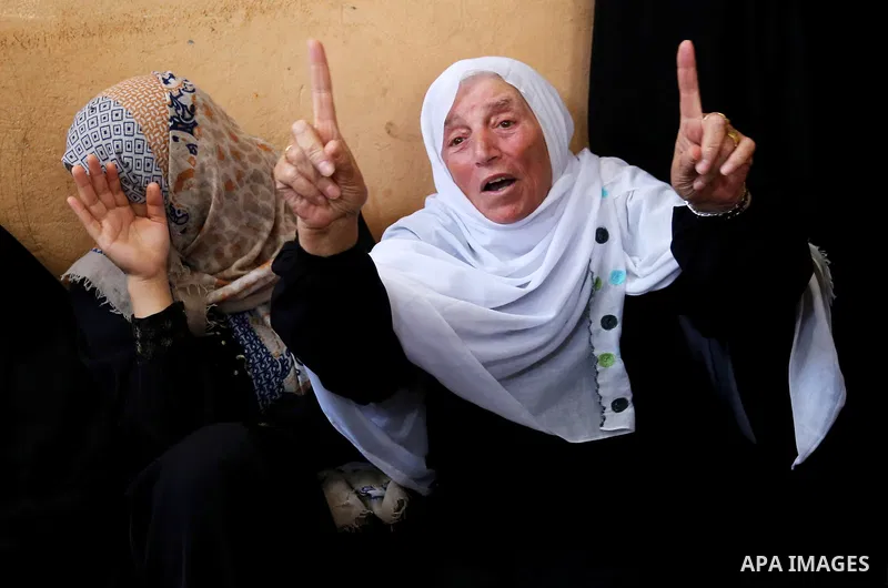 Relatives of 24-year-old Palestinian Mohammed al-Hamayda, who was killed by Israeli troops during clashes in tents protest where Palestinian demand the right to return to their homeland at the Israel-Gaza border, mourn d...