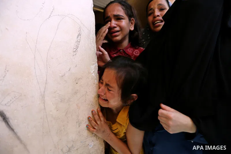 Relatives of 24-year-old Palestinian Mohammed al-Hamayda, who was killed by Israeli troops during clashes in tents protest where Palestinian demand the right to return to their homeland at the Israel-Gaza border, mourn d...