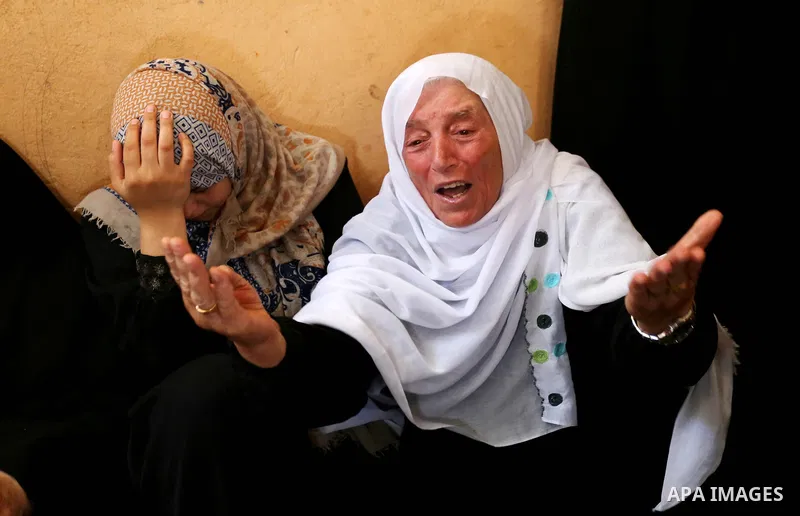 Relatives of 24-year-old Palestinian Mohammed al-Hamayda, who was killed by Israeli troops during clashes in tents protest where Palestinian demand the right to return to their homeland at the Israel-Gaza border, mourn d...
