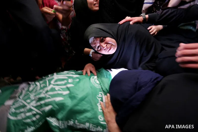 Relatives of 24-year-old Palestinian Mohammed al-Hamayda, who was killed by Israeli troops during clashes in tents protest where Palestinian demand the right to return to their homeland at the Israel-Gaza border, mourn o...