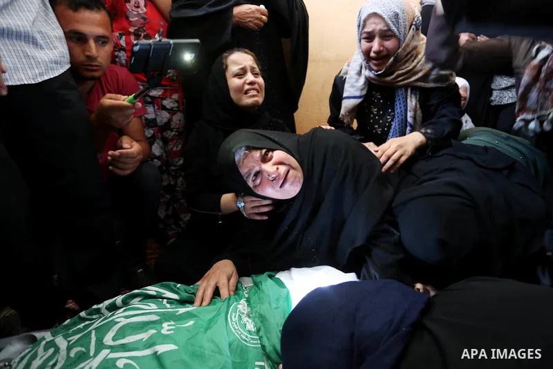 Relatives of 24-year-old Palestinian Mohammed al-Hamayda, who was killed by Israeli troops during clashes in tents protest where Palestinian demand the right to return to their homeland at the Israel-Gaza border, mourn o...