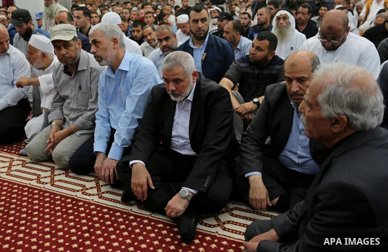 Chairman of the political bureau of the Hamas Palestinian Islamist movement, Ismail Haniyeh and Hamas's leader in the Gaza Strip Yahya Sinwar participates in the funeral of 14-year-old Palestinian boy Yasser Abu Al-Naja,...