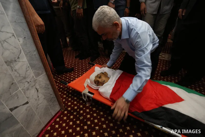 Hamas's leader in the Gaza Strip Yahya Sinwar participates in the funeral of 14-year-old Palestinian boy Yasser Abu Al-Naja, who was killed by Israeli troops during clashes in tents protest where Palestinian demand the r...