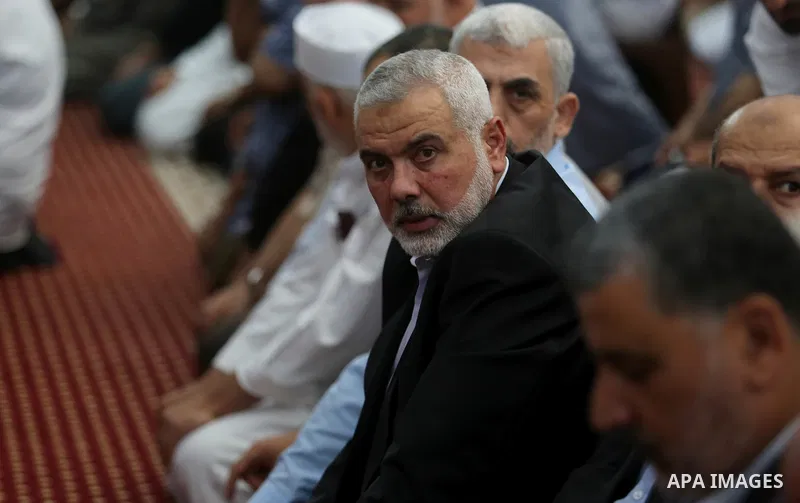 Chairman of the political bureau of the Hamas Palestinian Islamist movement, Ismail Haniyeh and Hamas's leader in the Gaza Strip Yahya Sinwar participates in the funeral of 14-year-old Palestinian boy Yasser Abu Al-Naja,...