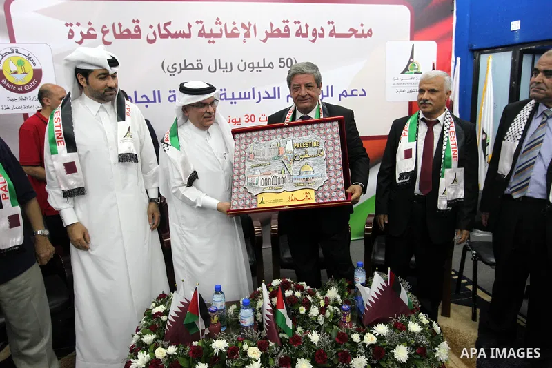 Qatar's Ambassador to the Palestinian Authority, Mohammed Al Emadi attends the ceremony of provide a grant to support the fees of Palestinian needy students at Al-Aqsa University, in Gaza city on June 30, 2018. Photo by...