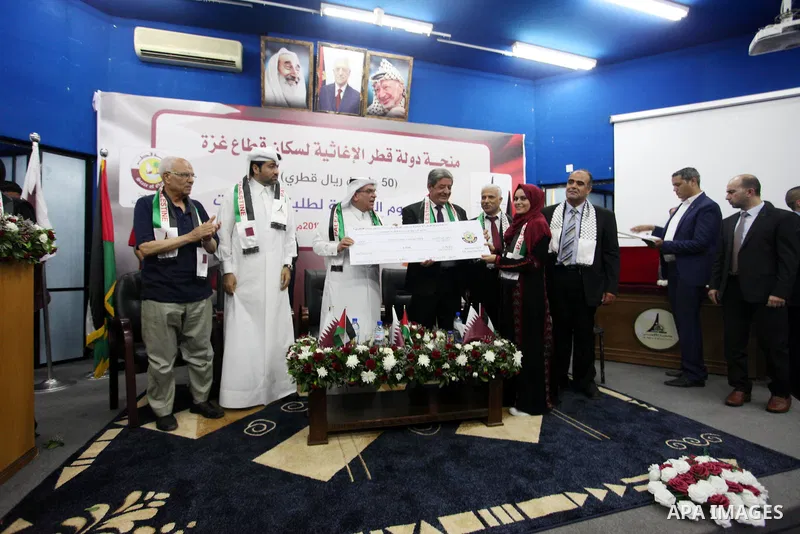 Qatar's Ambassador to the Palestinian Authority, Mohammed Al Emadi attends the ceremony of provide a grant to support the fees of Palestinian needy students at Al-Aqsa University, in Gaza city on June 30, 2018. Photo by...